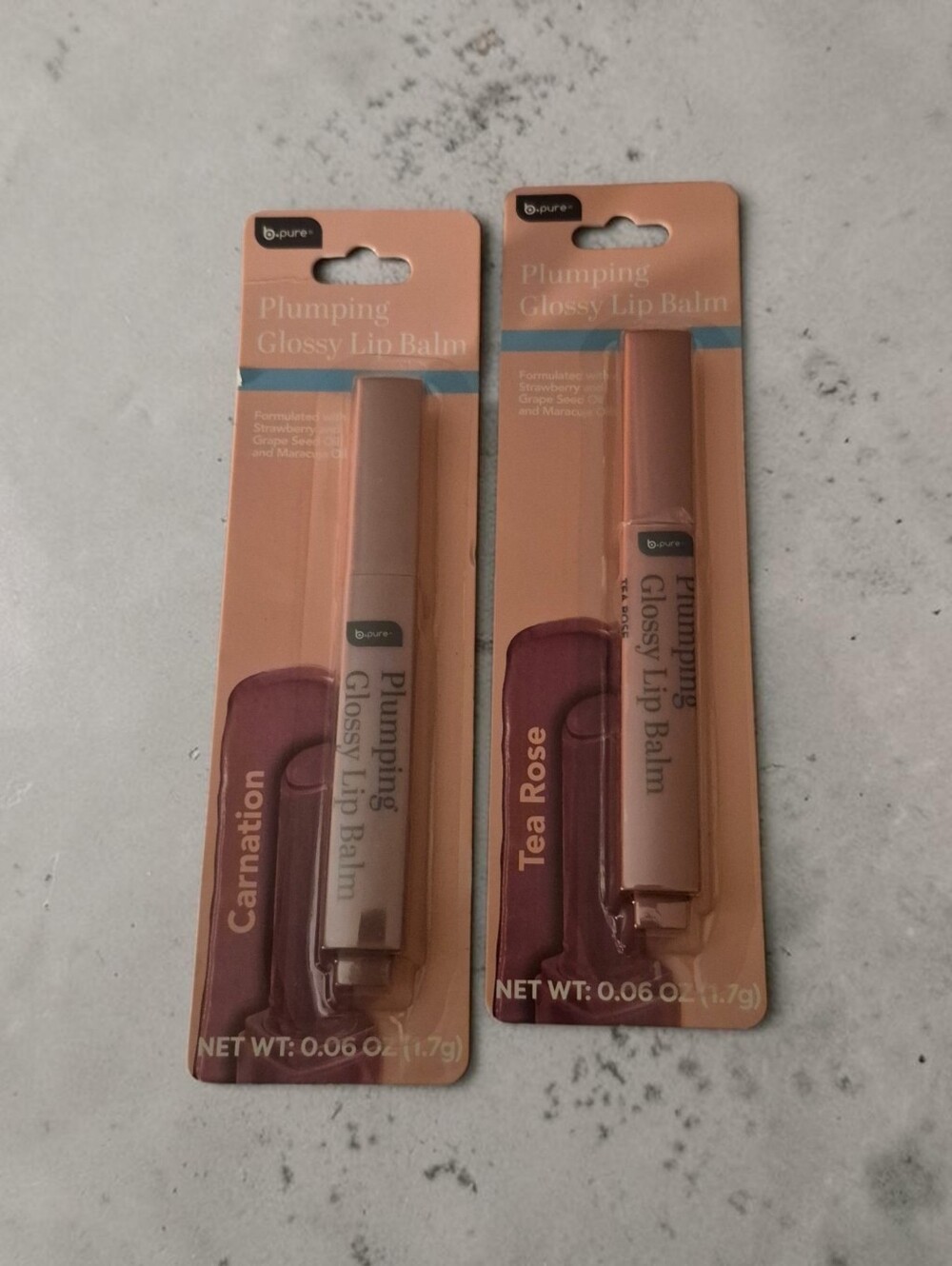 b.pure Plumping Glossy Lip Balms In Carnation & Tea Rose